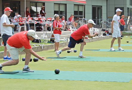 Members playing bowls at Canada Fun Day
