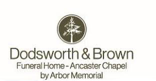 Some stylized text with a single white tree superimposed on a brown circular logo